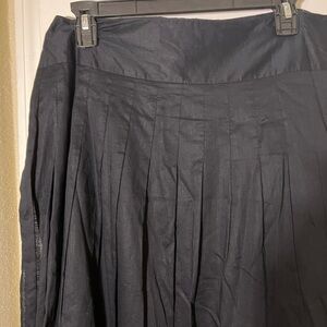 NWOT Black Apostrophe Midi skirt.